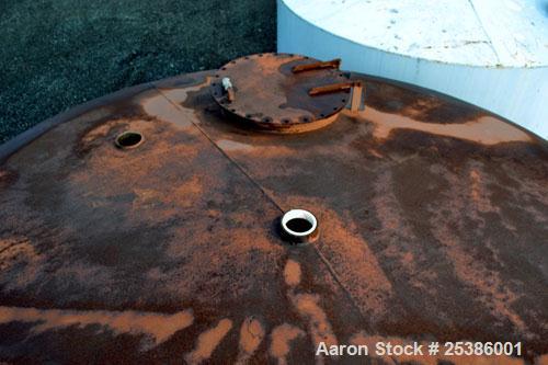 Used Highland Tank, 7800 Gallon, Carbon Steel, Vertical. 132" Diameter x 132" straight side, coned top, flat bottom. Openings top (2) approximate 4-1/4" NPT, 23-1/2" man way with cover, side approxim...