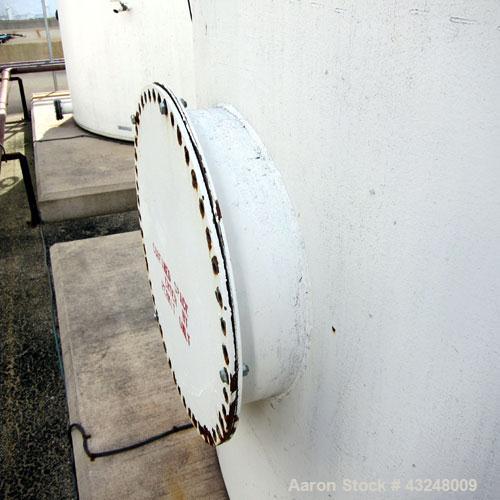 Used Highland Tank, 16,920 Gallon, Carbon Steel, Vertical. Approximately 12' diameter x 20' straight side, slight coned top, flat bottom. U.L. 142 labeled for above ground flammable storage. Openings...