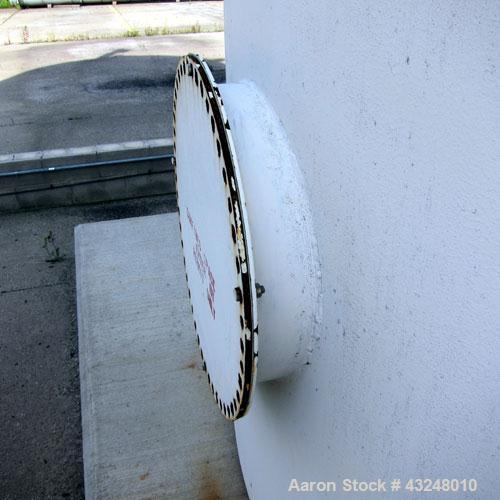 Used Highland Tank, 16,920 Gallon, Carbon Steel, Vertical. Approximately 12' diameter x 20' straight side, slight coned top, flat bottom. U.L. 142 labeled for above ground flammable storage. Openings...