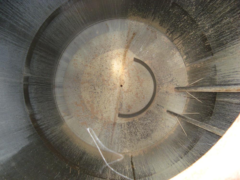 Used Highland Tank 10,000 Gallon Vertical Carbon Steel Single Wall Storage Tank.  Flat top and cone bottom, 1/4" thick shell.  10' 2" Diameter X 19' high overall.  Mounted on 2'6" steel skirt support...