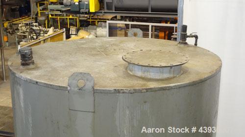 Used 3000 Gallon Carbon Steel Tank, Modern Welding Company, Approximately 7' diameter x 11' high.   Flat Top and Bottom.    3" Side Bottom Outlet, 18" Top Manway, UL listed for Above-ground  - Flamma...