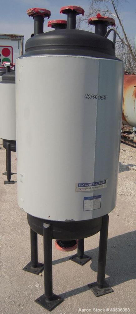 Unused- Mueller Pressure Tank, 75 Gallon, Model "F", SA-516 GR 70 carbon steel, vertical. 24'' diameter x 47'' straight side, dished top and bottom. Internal rated 30 psi at 500 deg F and -20 deg F a...