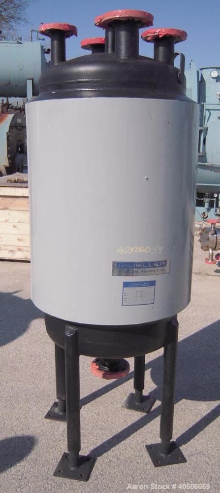 Unused- Mueller Pressure Tank, 75 Gallon, Model "F", SA-516 GR 70 carbon steel, vertical. 24" diameter x 40" straight side, dished top and bottom. Internal rated 30 psi at 600 deg F and -20 deg F at ...