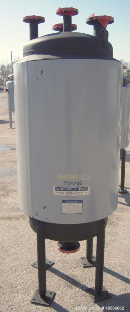 Unused- Mueller Pressure Tank, 75 Gallon, Model "F", SA-516 GR 70 carbon steel, vertical. 24'' diameter x 47'' straight side, dished top and bottom. Internal rated 30 psi at 500 deg F and -20 deg F a...