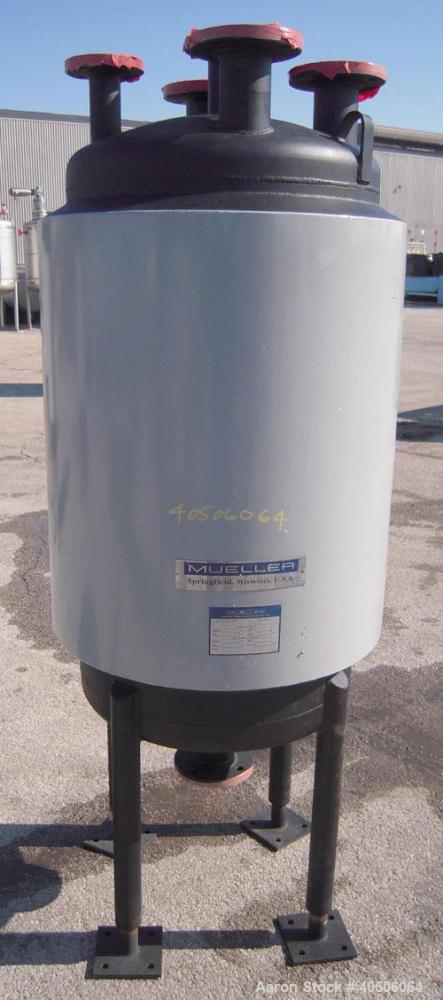 Unused- Mueller Pressure Tank, 75 Gallon, Model "F", SA-516 GR 70 carbon steel, vertical. 24'' diameter x 40'' straight side, dished top and bottom. Internal rated 30 psi at 600 deg F and -20 deg F a...