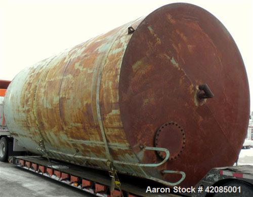 Used Tank, 20,000 Gallon, Carbon Steel, Vertical. 144" diameter x 288" straight side. Slight dished top, flat bottom. Openings: top 20" manway with cover, 4" vent; side 4", 20" manway with cover. Inc...