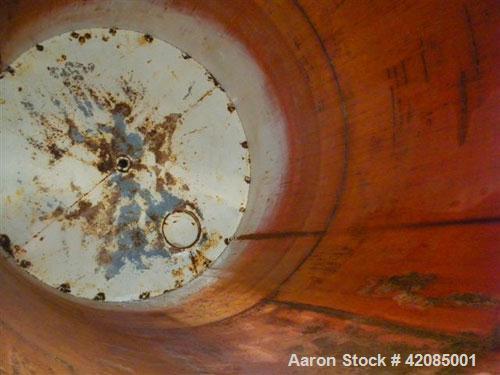 Used Tank, 20,000 Gallon, Carbon Steel, Vertical. 144" diameter x 288" straight side. Slight dished top, flat bottom. Openings: top 20" manway with cover, 4" vent; side 4", 20" manway with cover. Inc...
