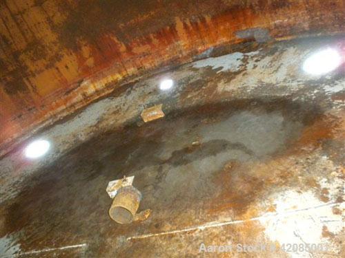 Used Tank, 20,000 Gallon, Carbon Steel, Vertical. 144" diameter x 288" straight side. Slight dished top, flat bottom. Openings: top 20" manway with cover, 4" vent; side 4", 20" manway with cover. Inc...