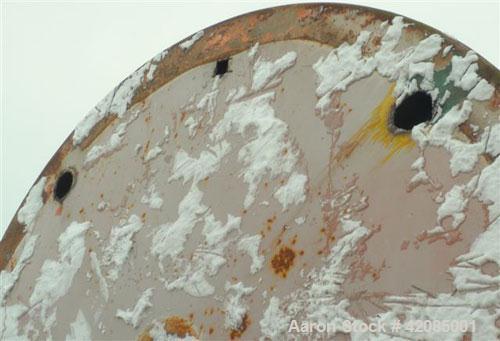Used Tank, 20,000 Gallon, Carbon Steel, Vertical. 144" diameter x 288" straight side. Slight dished top, flat bottom. Openings: top 20" manway with cover, 4" vent; side 4", 20" manway with cover. Inc...