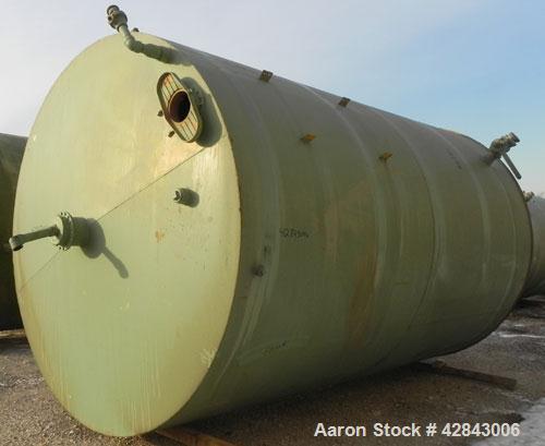 Used Tank, Carbon Steel, 9,500 Gallon, Vertical. Approximately 120" diameter x 192" straight side. Slight coned top and bottom. Openings top 8", 36" x 24" Side bottom opening, 3-1/2" tangential cente...