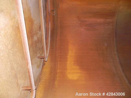 Used Tank, Carbon Steel, 9,500 Gallon, Vertical. Approximately 120" diameter x 192" straight side. Slight coned top and bottom. Openings top 8", 36" x 24" Side bottom opening, 3-1/2" tangential cente...