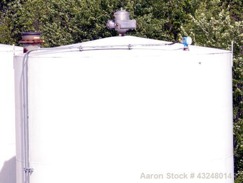 Used Silo, 4009 Cubic Feet (30,000 Gallon), Carbon Steel. Approximate 144" Diameter x 36' tall. Dished top, flat bottom. 18" Man way with cover, (2) 3" side bottom outlets.