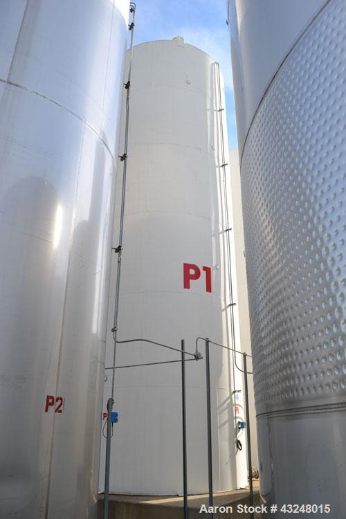 Used Silo, 4009 Cubic Feet (30,000 Gallon), Carbon Steel. Approximate 144" Diameter x 36' tall. Dished top, flat bottom. 18" Man way with cover, (2) 3" side bottom outlets.