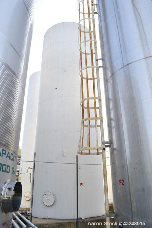 Used Silo, 4009 Cubic Feet (30,000 Gallon), Carbon Steel. Approximate 144" Diameter x 36' tall. Dished top, flat bottom. 18" Man way with cover, (2) 3" side bottom outlets.