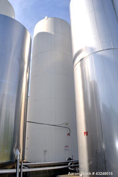 Used Silo, 4009 Cubic Feet (30,000 Gallon), Carbon Steel. Approximate 144" Diameter x 36' tall. Dished top, flat bottom. 18" Man way with cover, (2) 3" side bottom outlets.