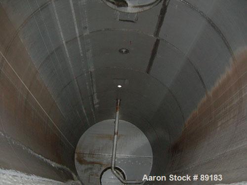 USED: Nooter tank, 9600 gallon, carbon steel, horizontal. Approximately 124" diameter x 184" straight side, dished heads. Top openings: 18" flanged, 6" flanged, 2", 1", 1-1/2"; 3" NPT bottom outlet. ...