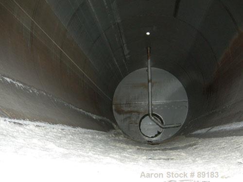 USED: Nooter tank, 9600 gallon, carbon steel, horizontal. Approximately 124" diameter x 184" straight side, dished heads. Top openings: 18" flanged, 6" flanged, 2", 1", 1-1/2"; 3" NPT bottom outlet. ...