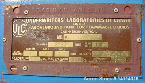 Used 9,600 US gallon carbon steel tank built by O'Connor Tanks Ltd. Vertical, 8'6" diameter x 23' high (T-T). 12" dome top. Flat bottom with 3" drain. Top and bottom manway. Overall height 24'. Top l...