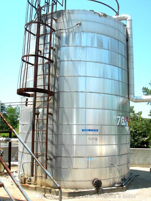 USED: Wolfe Mechanical and Equipment tank, 13,600 gallon, carbon steel, vertical. Approximate 144" diameter x 192" straight side. Dish top, flat bottom. Openings: top (3) 3", 1-1/2"; side 3/4", 1", 1...