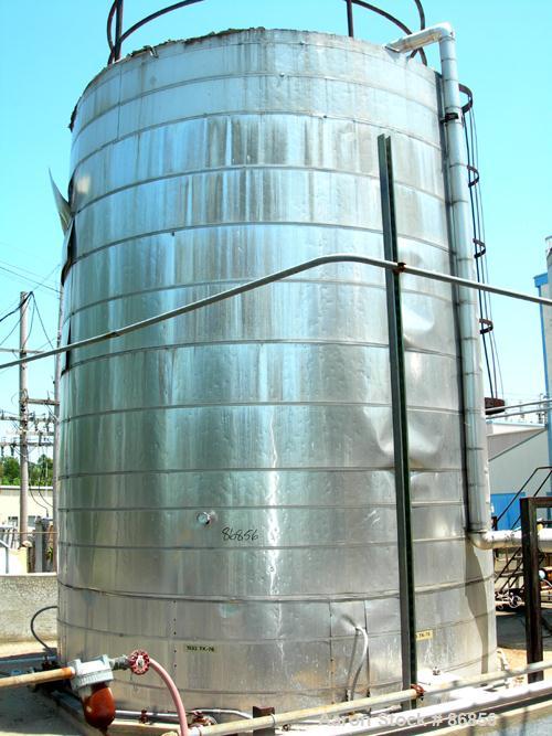 USED: Wolfe Mechanical and Equipment tank, 13,600 gallon, carbon steel, vertical. Approximate 144" diameter x 192" straight side. Dish top, flat bottom. Openings: top (3) 3", 1-1/2"; side 3/4", 1", 1...
