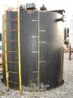 Used-3000 Gallon Mix Tank with Philadelphia Mixer, Carbon Steel Construction. Tank is 8' tall and approximately 8' in diamet...