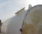 Used-9,840 US Gallon Carbon Steel Tank. Vertical, 10' diameter x 17' high (T-T). 12" dome top. Flat bottom with 3" drain. To...