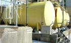 Used:  Carbon steel/rubber lined hydrachloric acid storage tank, approximate 10,000 gallon, horizontal. Approximate 10' diameter x 20' straight side, dished ends, top manway, 4