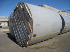 Used Tank, 8500 gallon, carbon steel,  vertical. Approximately 11' diameter x 12' straight side, dished top, flat bottom. Top manway, 4