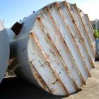 Used Tank, 8500 gallon, carbon steel,  vertical. Approximately 11' diameter x 12' straight side, dished top, flat bottom. Top manway, 4