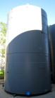 Unused- Highland Tank, 16,920 gallon, carbon steel, vertical. Approximately 12' diameter x 20' straight side, slight coned top, flat bottom. U.L. 142 labeled for above ground flammable storage. Openi...