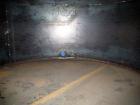 Unused: Highland tank, 16,920 gallon, carbon steel, vertical. Approximately 12' diameter x 20' straight side, slight coned top, flat bottom. U.L. 142 labeled for above ground flammable storage. Openi...