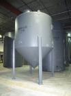 Unused: Highland tank, 6,000 gallon, carbon steel, vertical. Approximately 11' diameter x 8' straight side. Dished top, coned bottom. Openings: top 4