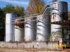 USED: Diesel storage tank farm consisting of (3) 12,000 gallon and(2) 15,000 gallon carbon steel vertical tanks. All tanks are 10'diameter. 12,000 gallon tanks are 22' high and the 15,000 gallontanks...