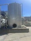 Used approximately 9000 gallon carbon steel vertical storage tank.