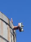 Used approximately 9000 gallon carbon steel vertical storage tank.