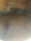 Used approximately 9000 gallon carbon steel vertical storage tank.