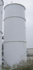 Used Clawson Tank, 18,000 gallon, carbon steel. Approximately 10' diameter x 30' straight side. Flat top and bottom. 24