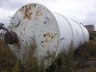 Used Clawson Tank, 18,000 gallon, carbon steel. Approximately 10' diameter x 30' straight side. Flat top and bottom. 24
