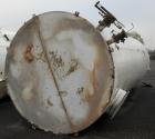USED: Clawson tank, 9,000 gallon, carbon steel. Approximately 8' diameter x 24' straight side. Flat top and bottom. 24