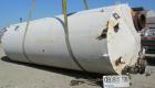USED: Clawson tank, 9,000 gallon, carbon steel. Approximately 8' diameter x 24' straight side. Slight coned top, flat bottom. Internal rated atmos at 70 deg F. Openings: top 2
