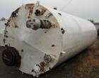 USED: Clawson tank, 9,000 gallon, carbon steel. Approximately 8' diameter x 24' straight side. Flat top and bottom. 24