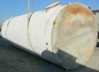 USED: Clawson tank, 9,000 gallon, carbon steel. Approximately 8' diameter x 24' straight side. Slight coned top, flat bottom. Internal rated atmos at 70 deg F. Openings: top 2