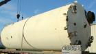 USED: Clawson tank, 9,000 gallon, carbon steel. Approximately 8' diameter x 24' straight side. Slight coned top, flat bottom. Internal rated atmos at 70 deg F. Openings: top 2