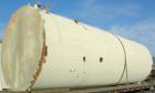 USED: Clawson tank, 9,000 gallon, carbon steel. Approximately 8' diameter x 24' straight side. Slight coned top, flat bottom. Internal rated atmos at 70 deg F. Openings: top 2