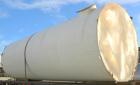 USED: Clawson tank, 9,000 gallon, carbon steel. Approximately 8' diameter x 24' straight side. Slight coned top, flat bottom. Internal rated atmos at 70 deg F. Openings: top 2