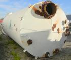 USED: Clawson tank, 9,000 gallon, carbon steel. Approximately 8' diameter x 24' straight side. Slight coned top, flat bottom. Internal rated atmos at 70 deg F. Openings: top 2