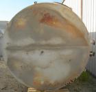 USED: Clawson tank, 9,000 gallon, carbon steel. Approximately 8' diameter x 24' straight side. Slight coned top, flat bottom. Internal rated atmos at 70 deg F. Openings: top 2