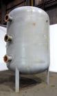 Used Fuller Company Pressure Tank, 3500 Gallon, Carbon Steel. Approximately 96” diameter x 96” straight side, elliptical top and bottom. Internal rated 150 psi at 500 degrees F. Openings: side (4) 8”...