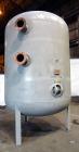 Used Fuller Company Pressure Tank, 3500 Gallon, Carbon Steel. Approximately 96” diameter x 96” straight side, elliptical top and bottom. Internal rated 150 psi at 500 degrees F. Openings: side (3) 8”...