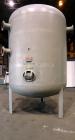 Used Fuller Company Pressure Tank, 3500 Gallon, Carbon Steel. Approximately 96” diameter x 96” straight side, elliptical top and bottom. Internal rated 150 psi at 500 degrees F. Openings: side (3) 8”...